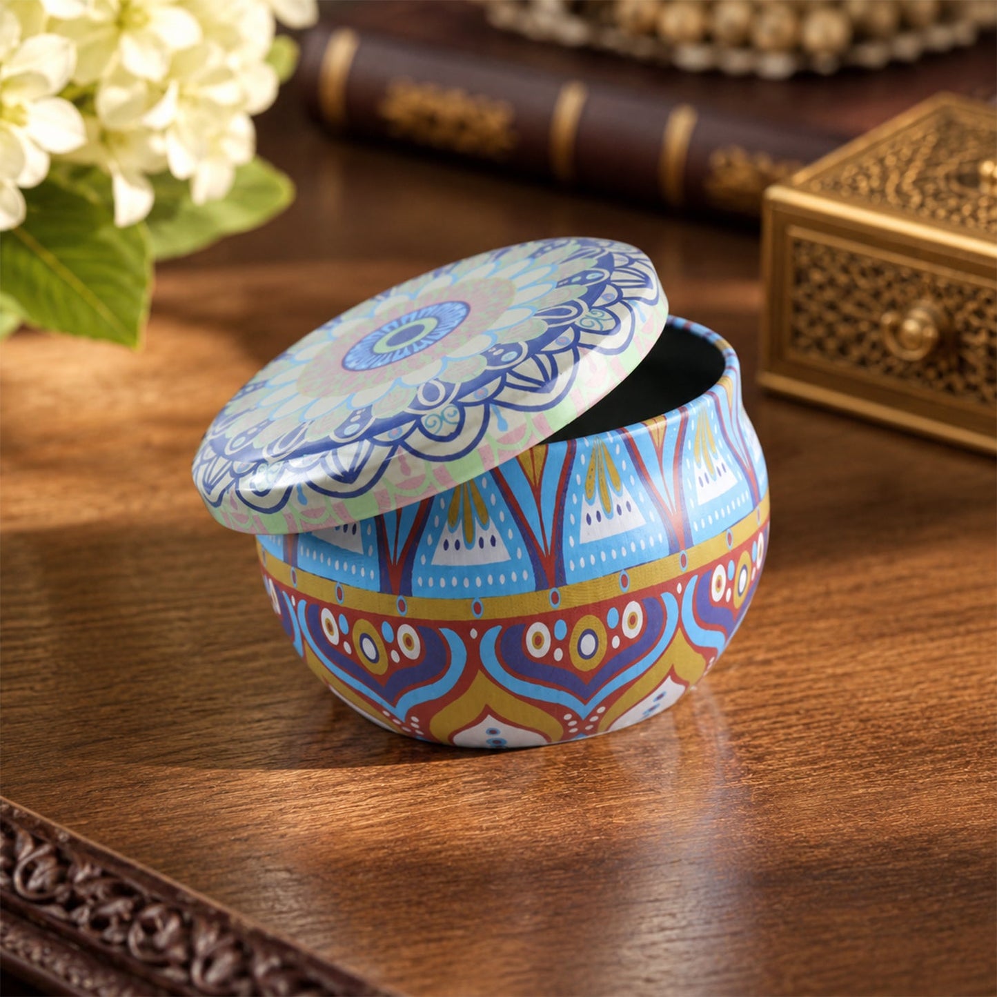 Wukusy metal mandala tin box with decorative round design, ideal for candles and trinkets, shown with intricate patterns and a closed lid.