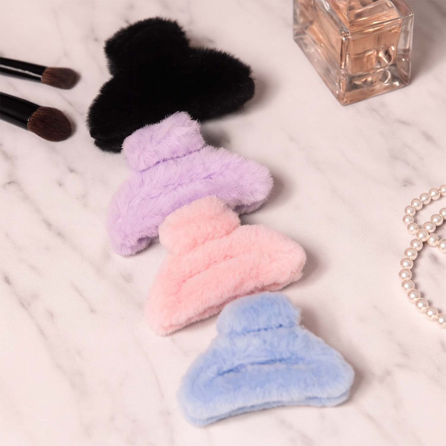 Wukusy big-size soft faux fur hair claw clip, natural beige color, large and plush for secure hair styling.