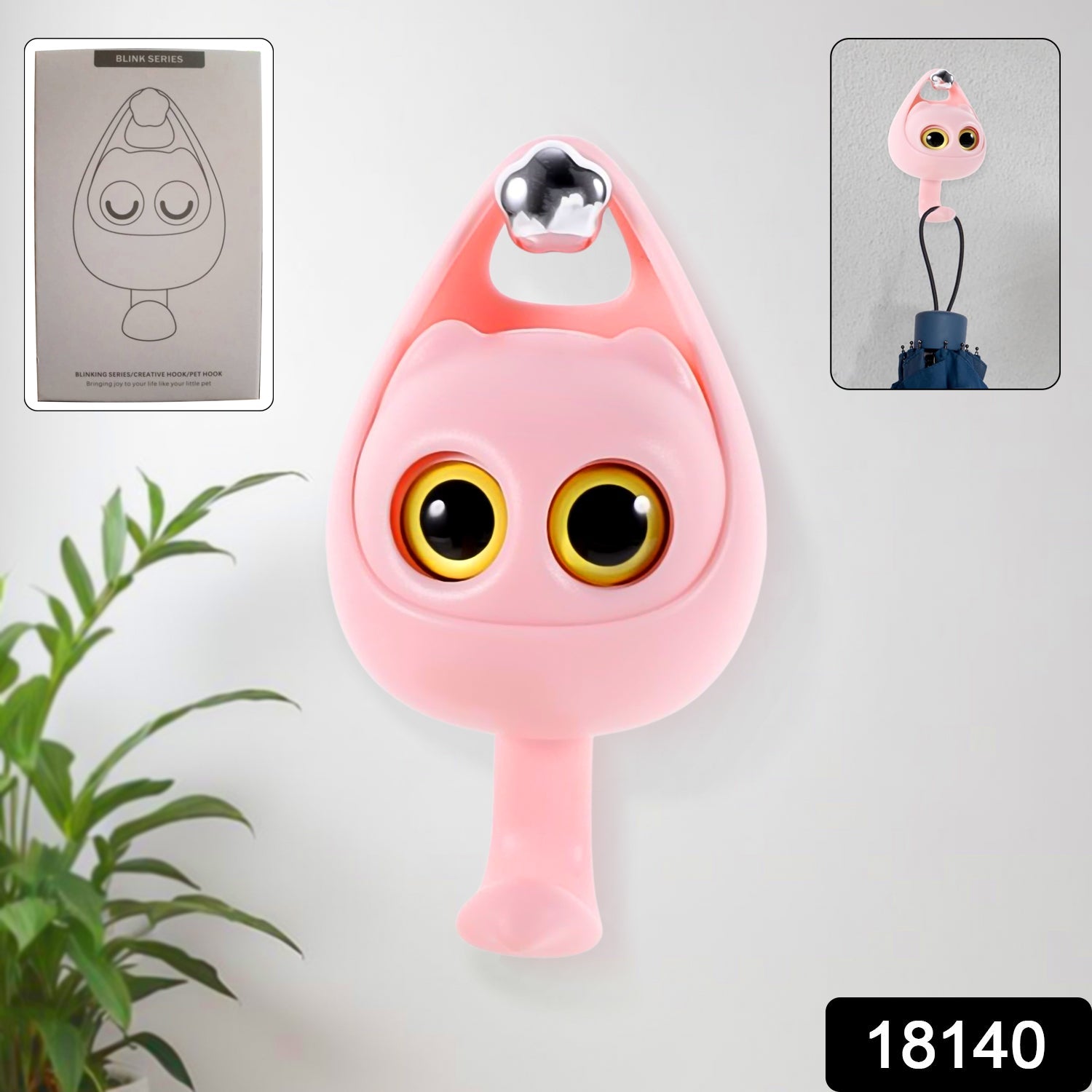 Wukusy Creative Adhesive Coat Hook featuring a playful wink cat design mounted on a wall for clothing and accessories.