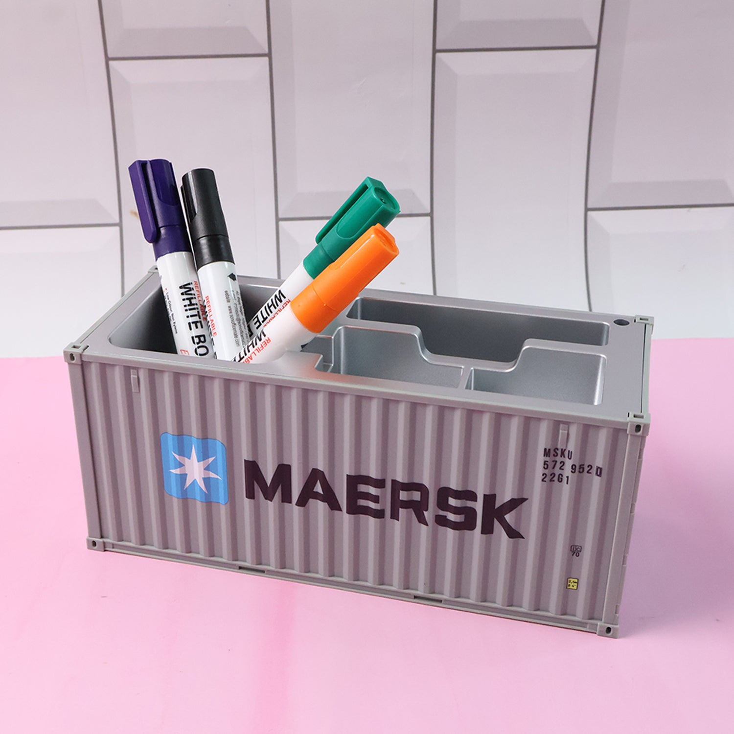 Wukusy multi-compartment desk organizer with several sections for pens, paper clips, and small office supplies on a desk