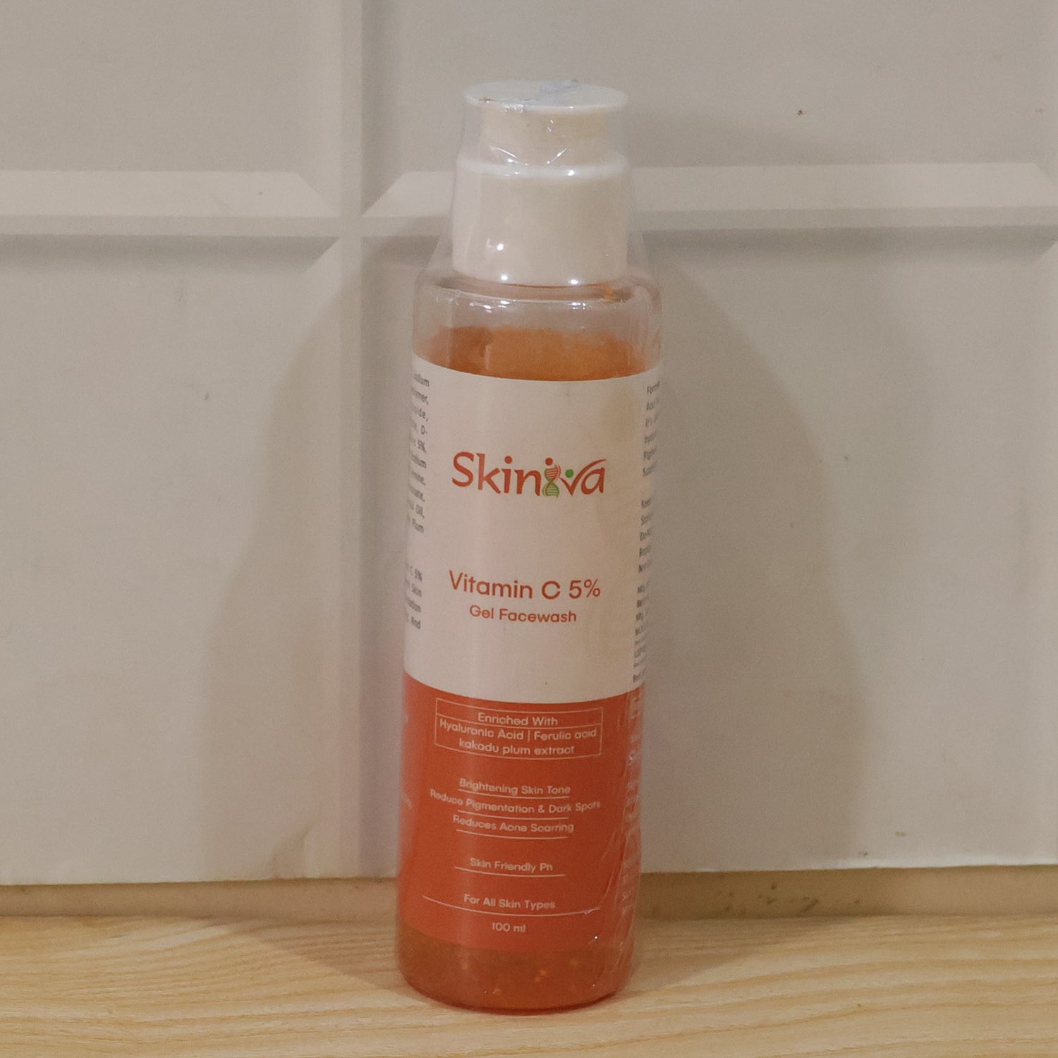 Wukusy Brightening Vitamin C Gel Face Wash in 100ml tube, showcasing the translucent gel with brightening ingredients.