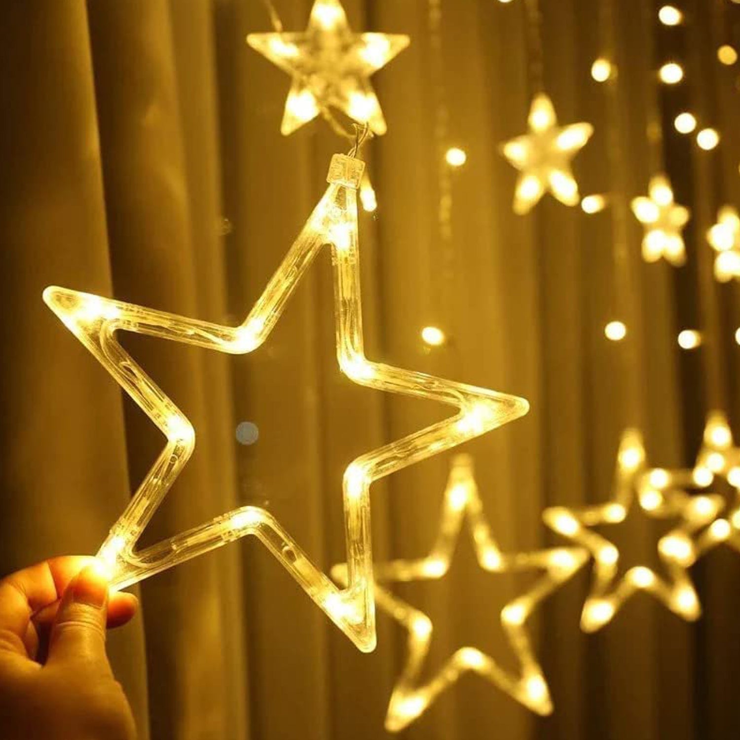 Wukusy 1253 12 Stars curtain string lights with flashing modes, used for window decoration and festive home decor.