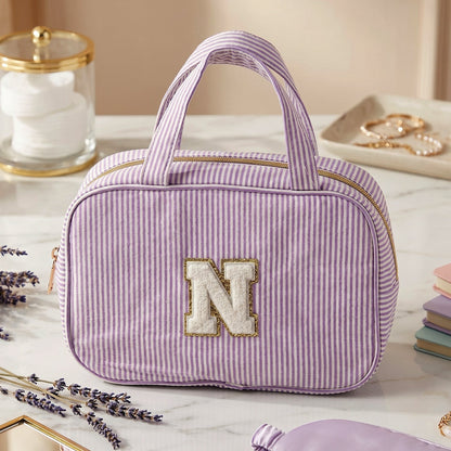 Wukusy travel multi-pocket toiletry bag hanging cosmetic organizer with compartments for toiletries and makeup.