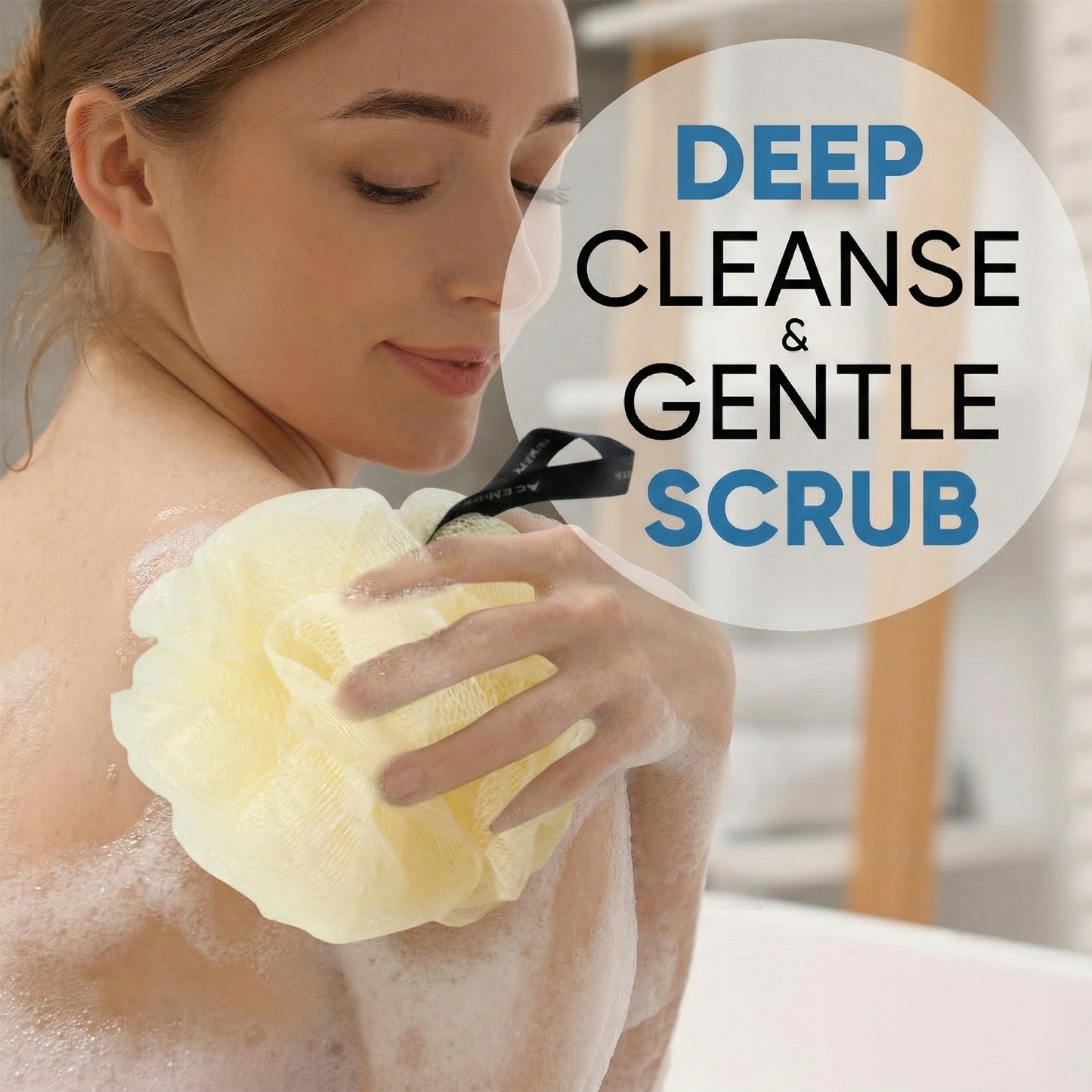 Wukusy soft mesh bath loofah scrubber, 1 piece, showing the gentle exfoliating surface for cleansing and lathering in the shower.