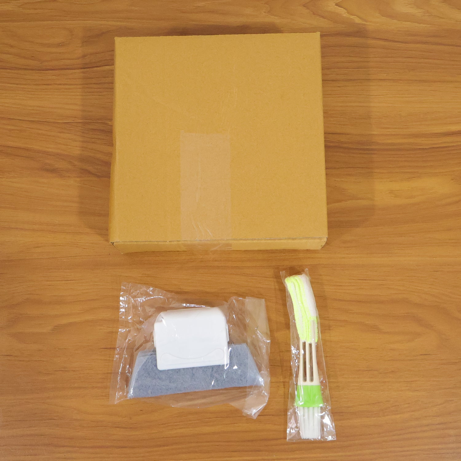 Wukusy multipurpose window and surface cleaning tool set with two durable scrub brushes and squeegee for versatile cleaning tasks.