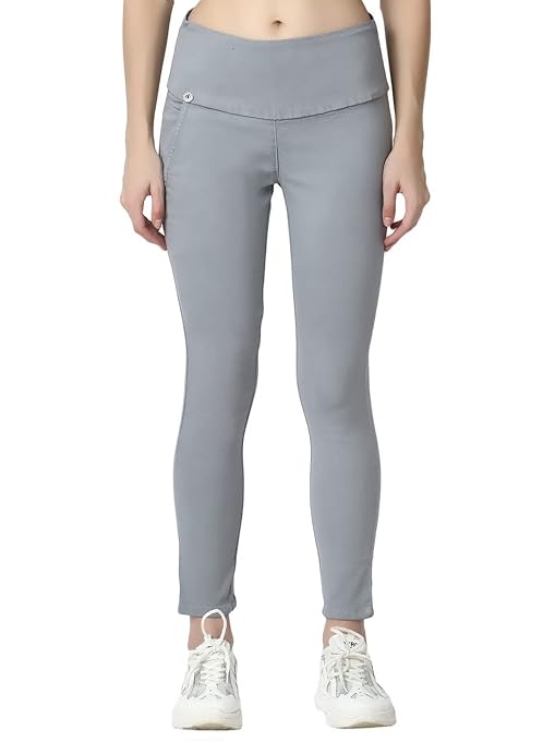 Gray skinny fit high waist ankle-length jeggings by FIZZI SHOP, showcasing a close-up of the fitted denim with subtle stitching details.