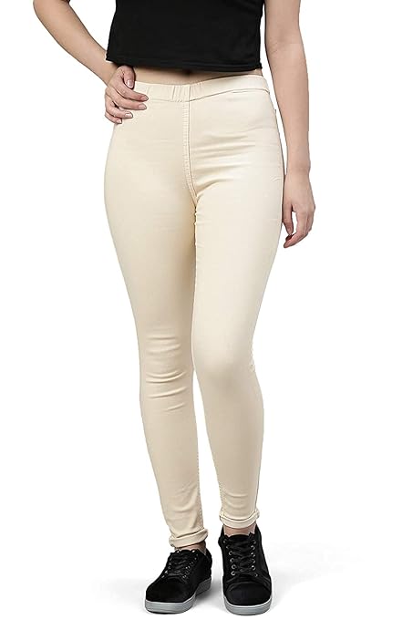 Beige women's slim fit denim jeggings with Lycra stretch, shown on a model, featuring a comfortable, form-fitting design.