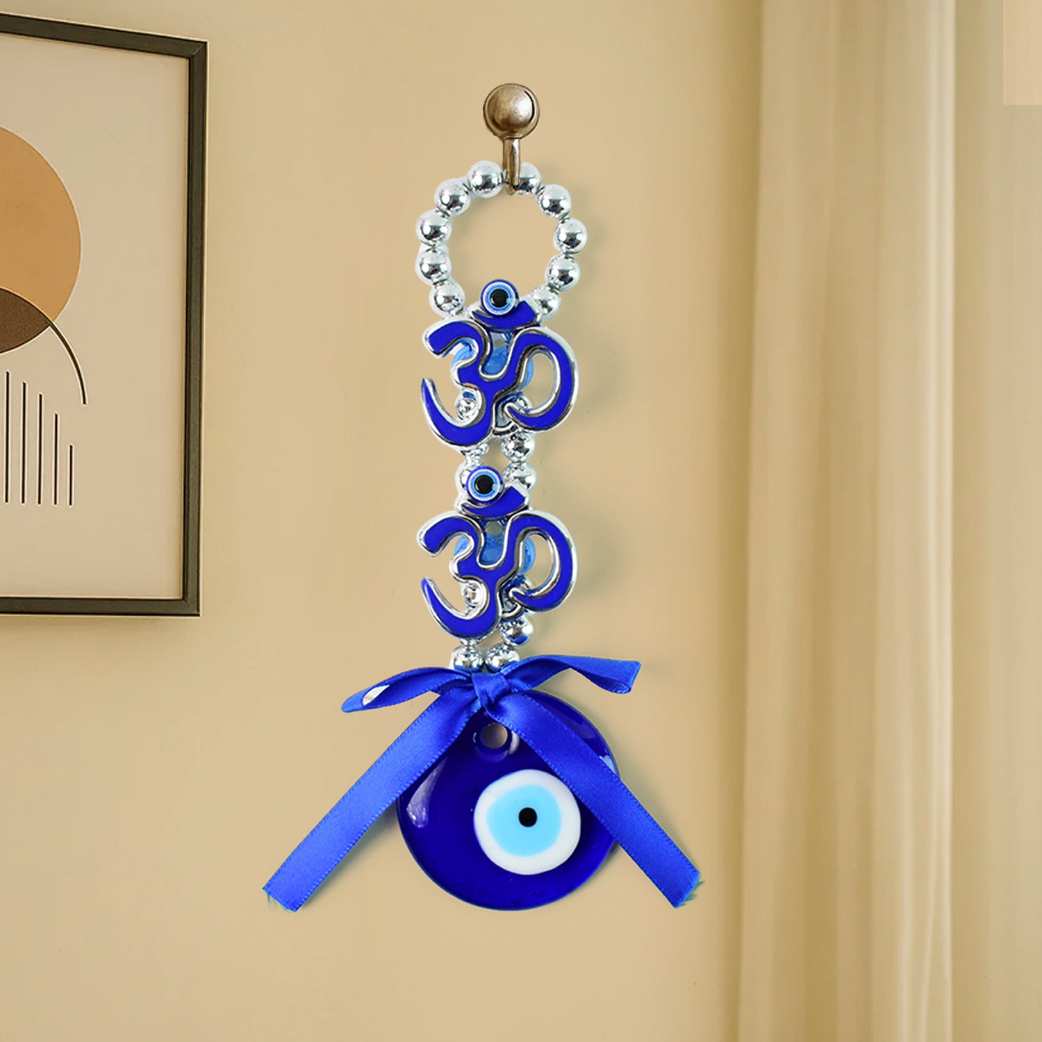 Decorative double Om symbol evil eye hanging ornament by Wukusy, featuring vibrant colors and intricate design for spiritual decor.