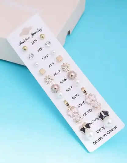 Set of 17 Ekom jewelry stud earrings for girls, featuring metal studs in various designs and sizes.
