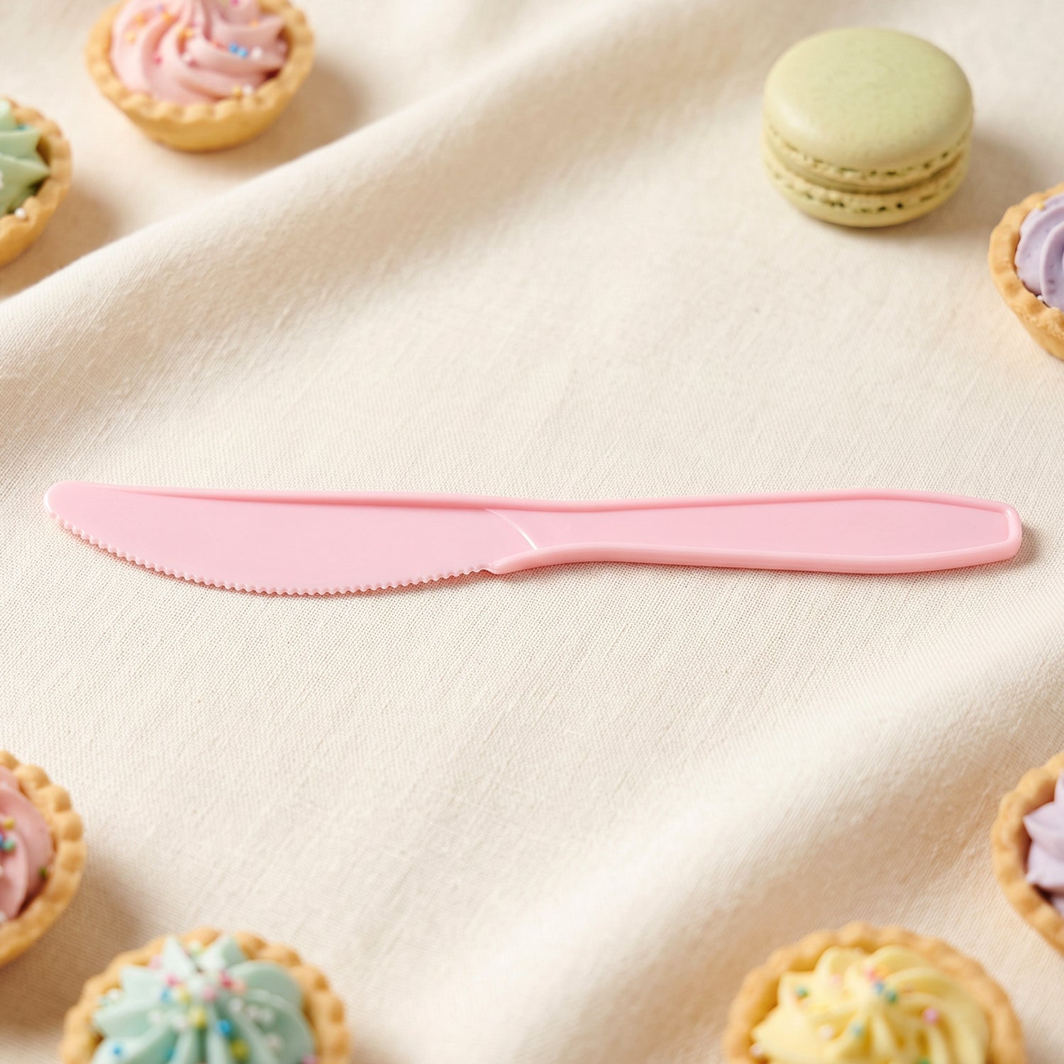 Set of 24 reusable multicolor plastic dessert knives by Wukusy, perfect for parties and gatherings.