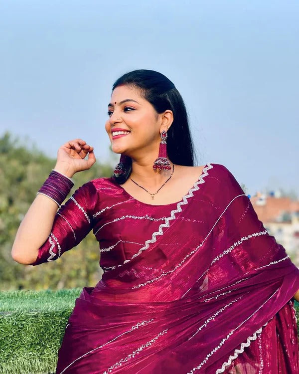 Women's Jimmy Choo saree with intricate handwork from the Drpshippr collection, showcasing detailed embroidery and elegant fabric.