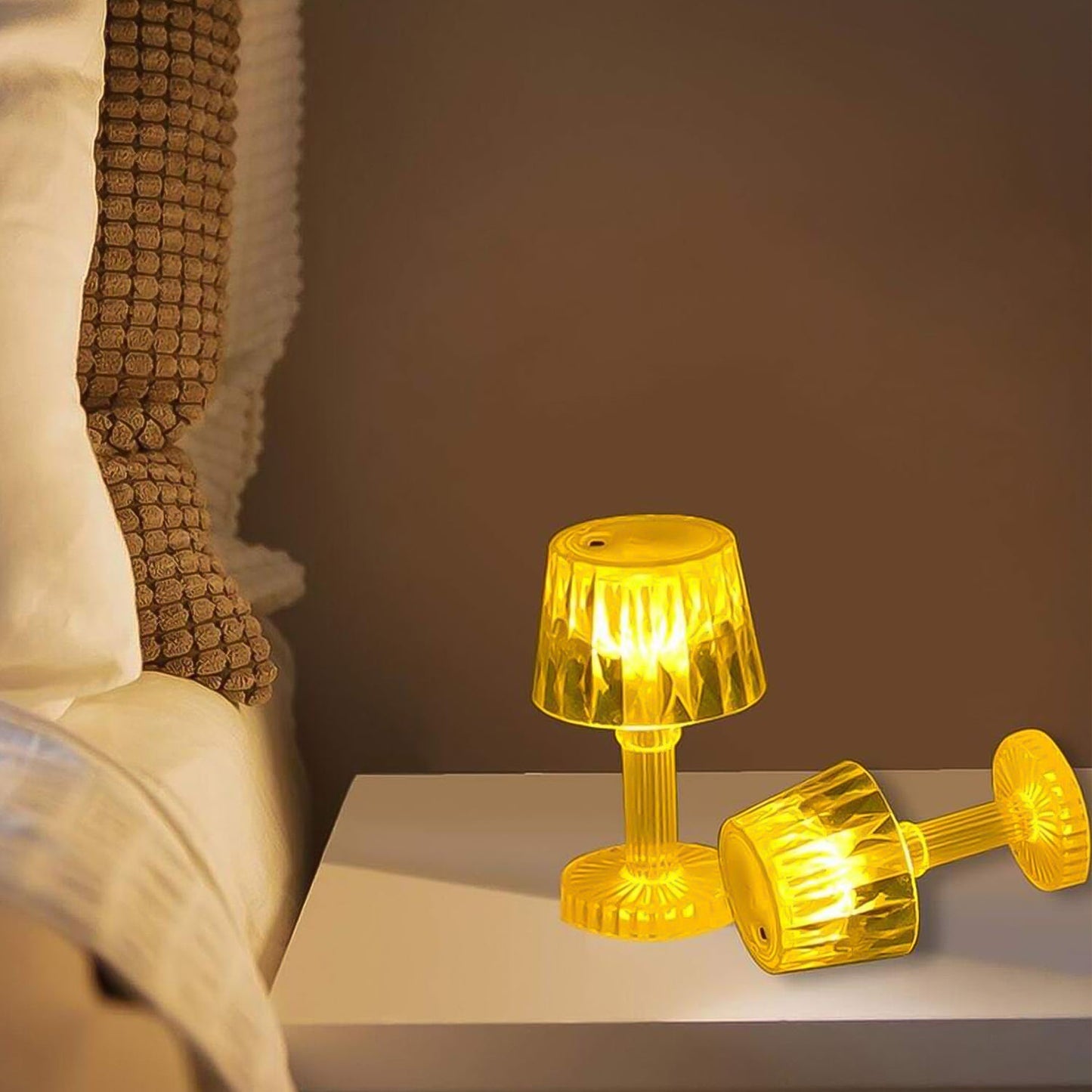 Small portable LED candle lamp by Wukusy featuring a plastic design, ideal for home lighting and ambiance.