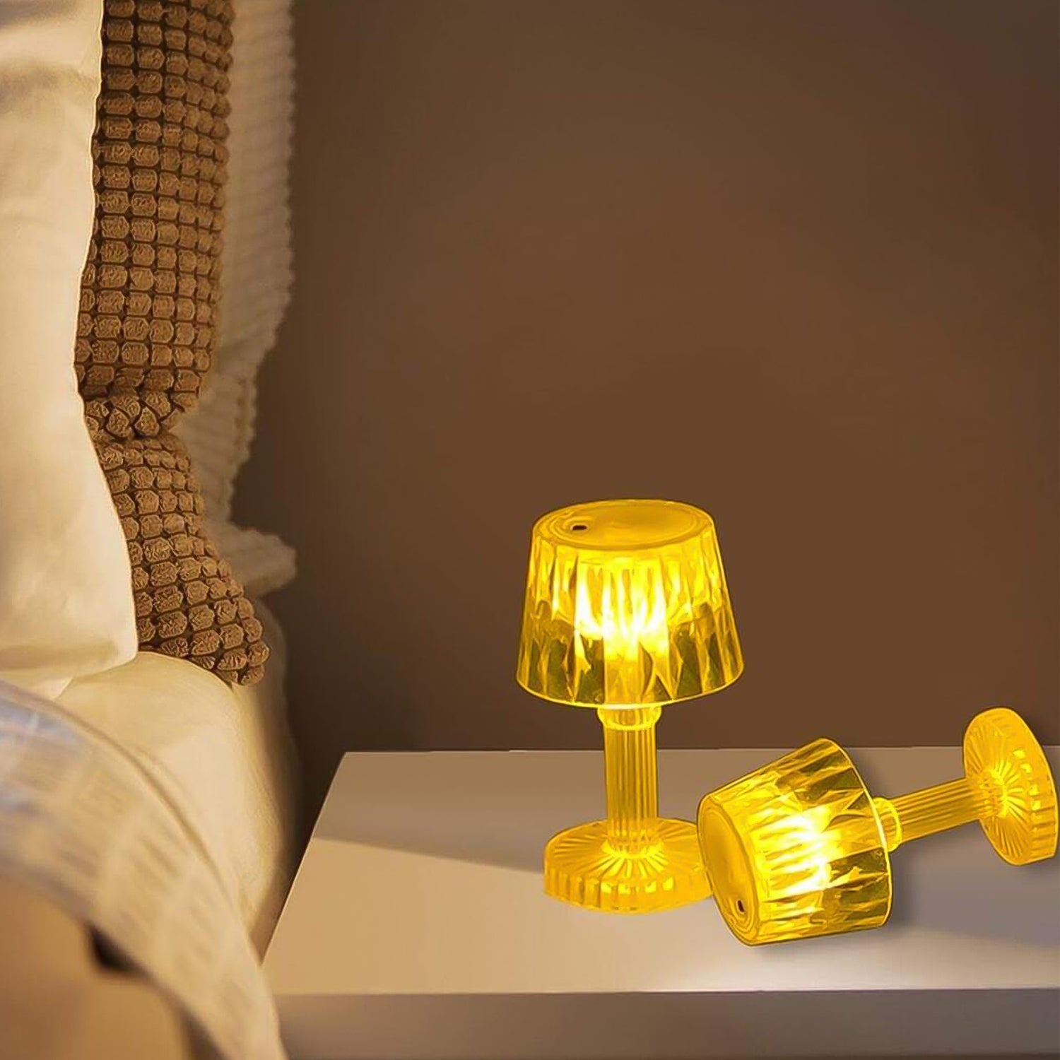 Small portable LED candle lamp by Wukusy featuring a plastic design, ideal for home lighting and ambiance.