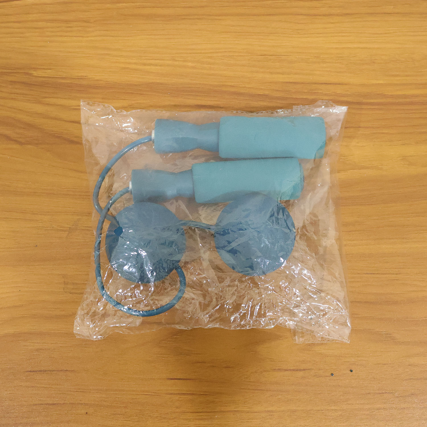 Pair of Wukusy fitness wrist balls with handle grips for hand and wrist exercises, shown with textured surface and adjustable straps.