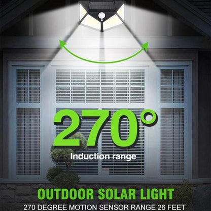 Wukusy 1255 solar garden lights with LED security lamps illuminating outdoor pathways and home exterior at night.