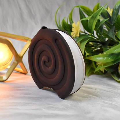 Wukusy round chocolate diary notebook with original scent, featuring a soft cover and blank pages for writing practice.