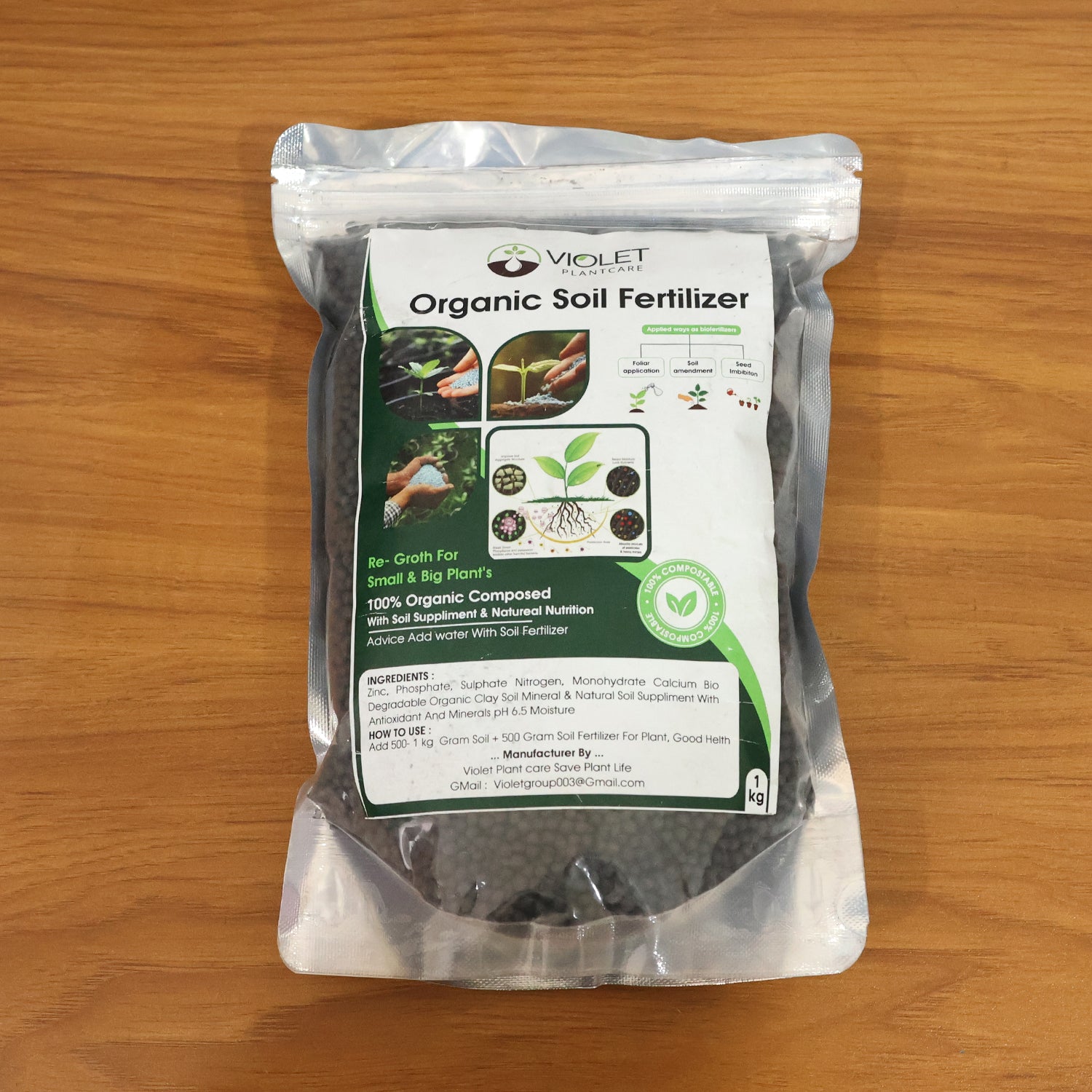 Black organic soil fertilizer for home gardening by Wukusy, 1 kg bag showing rich, dark soil ideal for healthy plant growth.