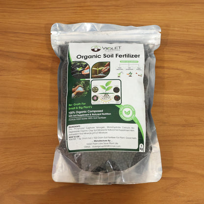 Black organic soil fertilizer for home gardening by Wukusy, 1 kg bag showing rich, dark soil ideal for healthy plant growth.