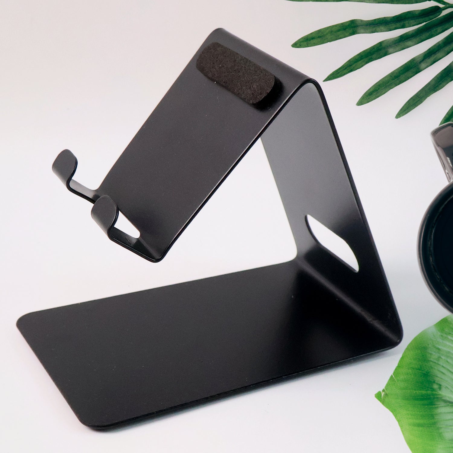 Wukusy metal universal mobile and tablet stand holder, adjustable and sturdy, supporting various devices for hands-free viewing.