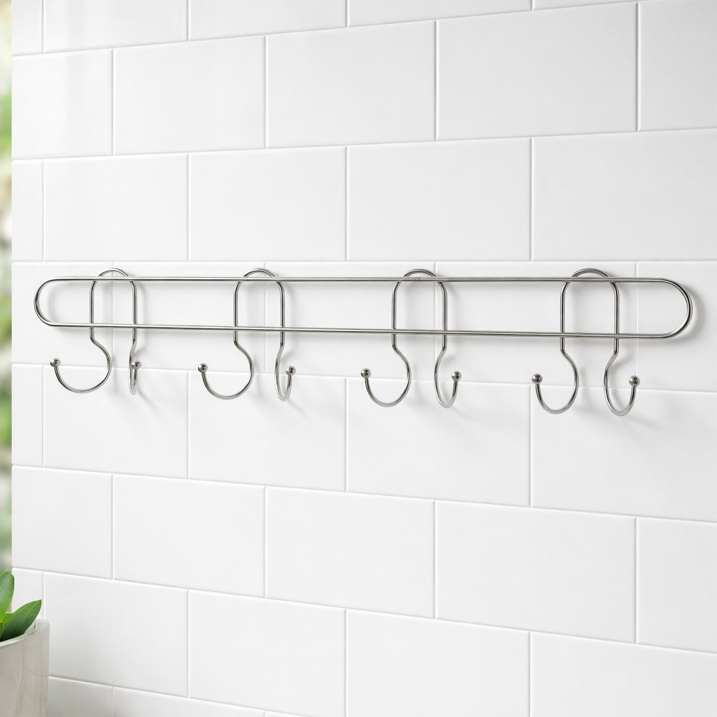 Heavy duty stainless steel wall-mounted hook rack by Wukusy with multiple hooks for organizing tools and accessories.
