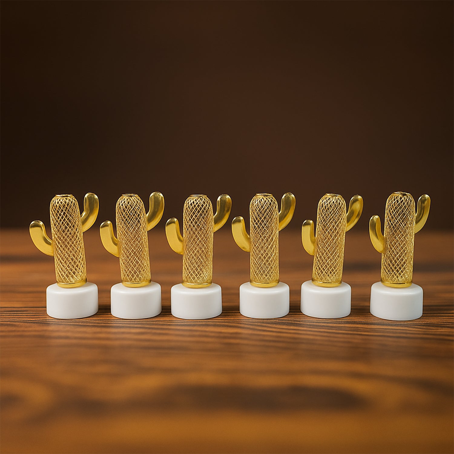 Set of 12 Wukusy decorative cactus-shaped flameless LED candles for home decor, featuring a cactus design and warm lighting.