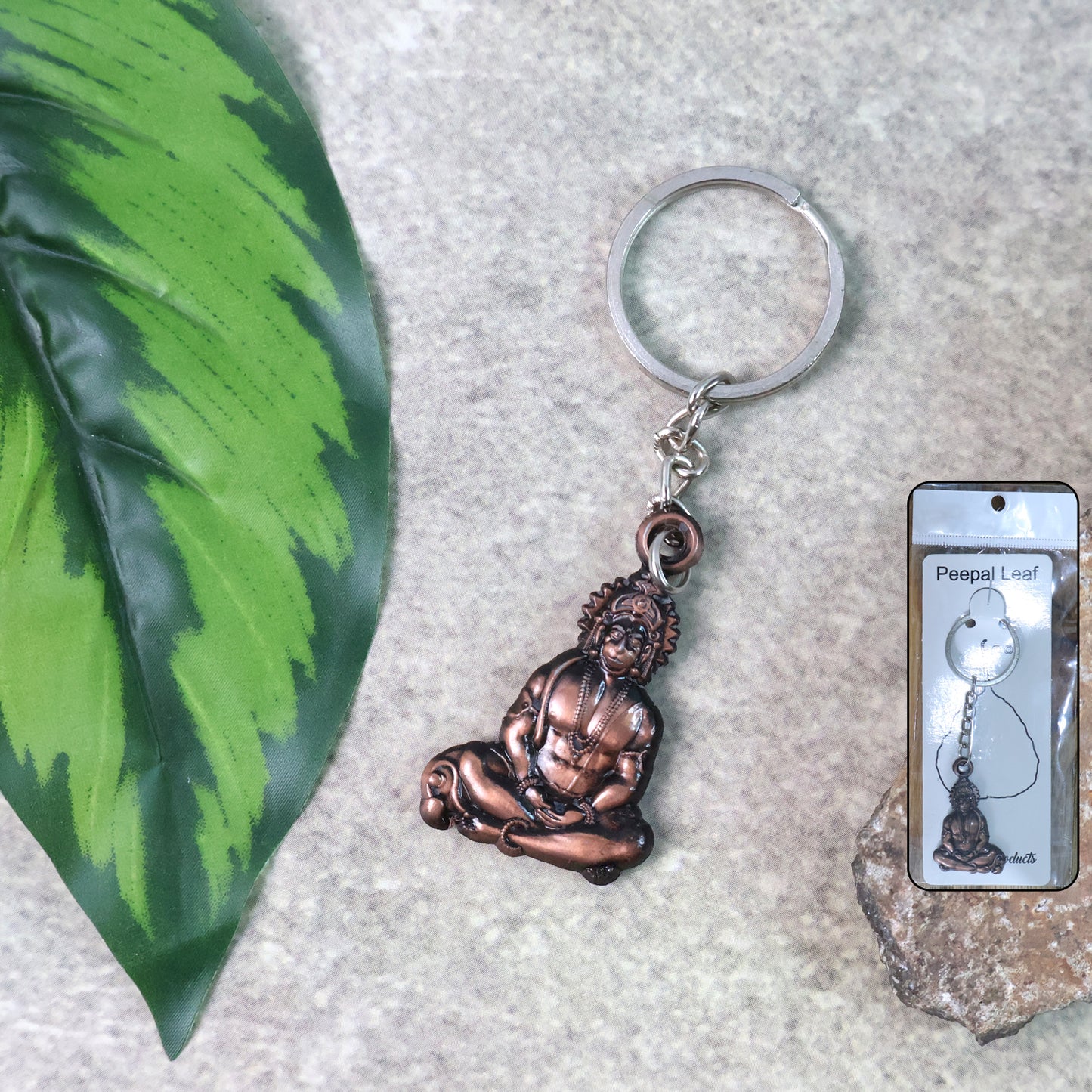 Wukusy Lord Hanuman sitting pose keychain featuring detailed miniature idol of Lord Hanuman in a seated stance.