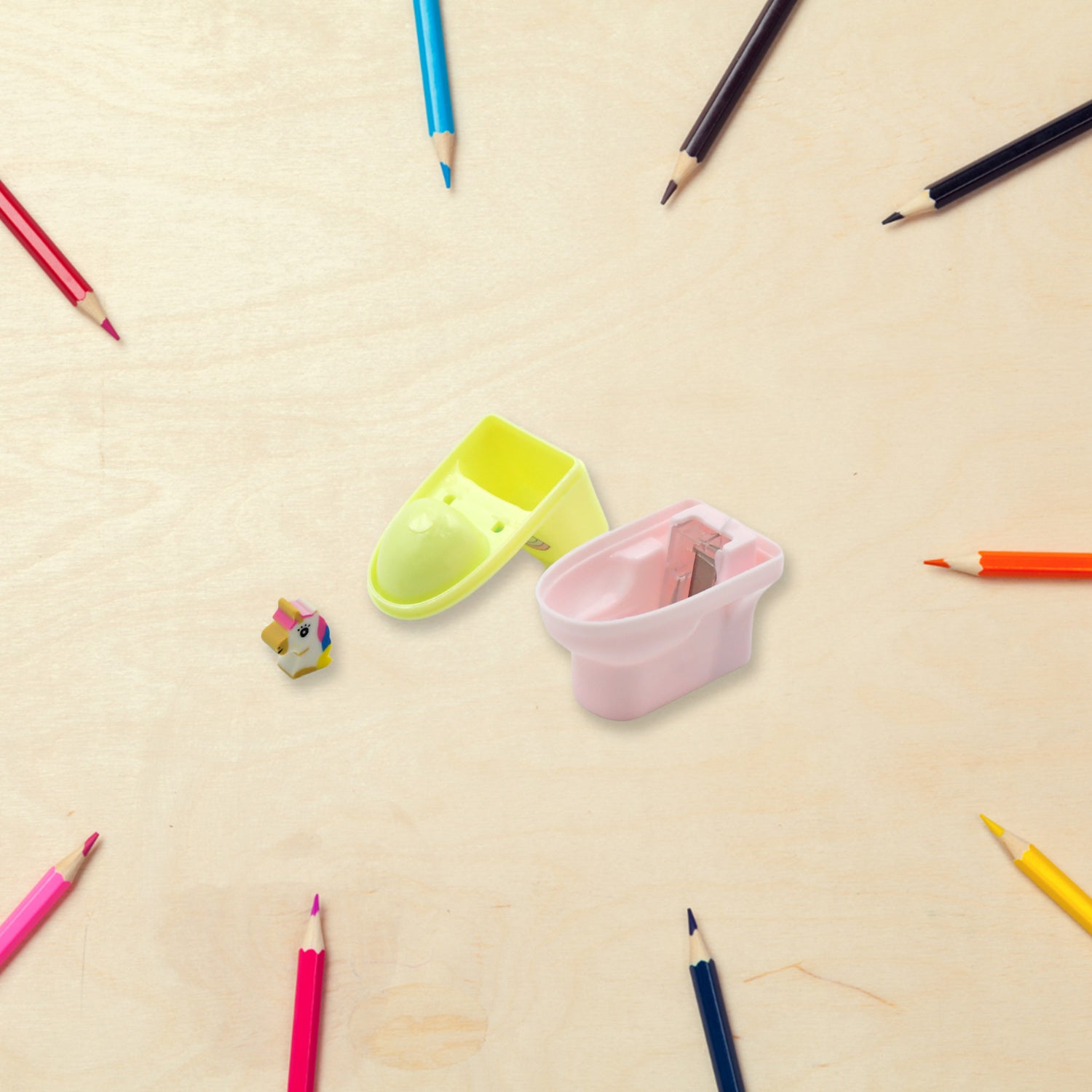 Wukusy toilet-shaped plastic pencil sharpener set with eraser wheel, featuring cute cartoon design for school kids and office use.