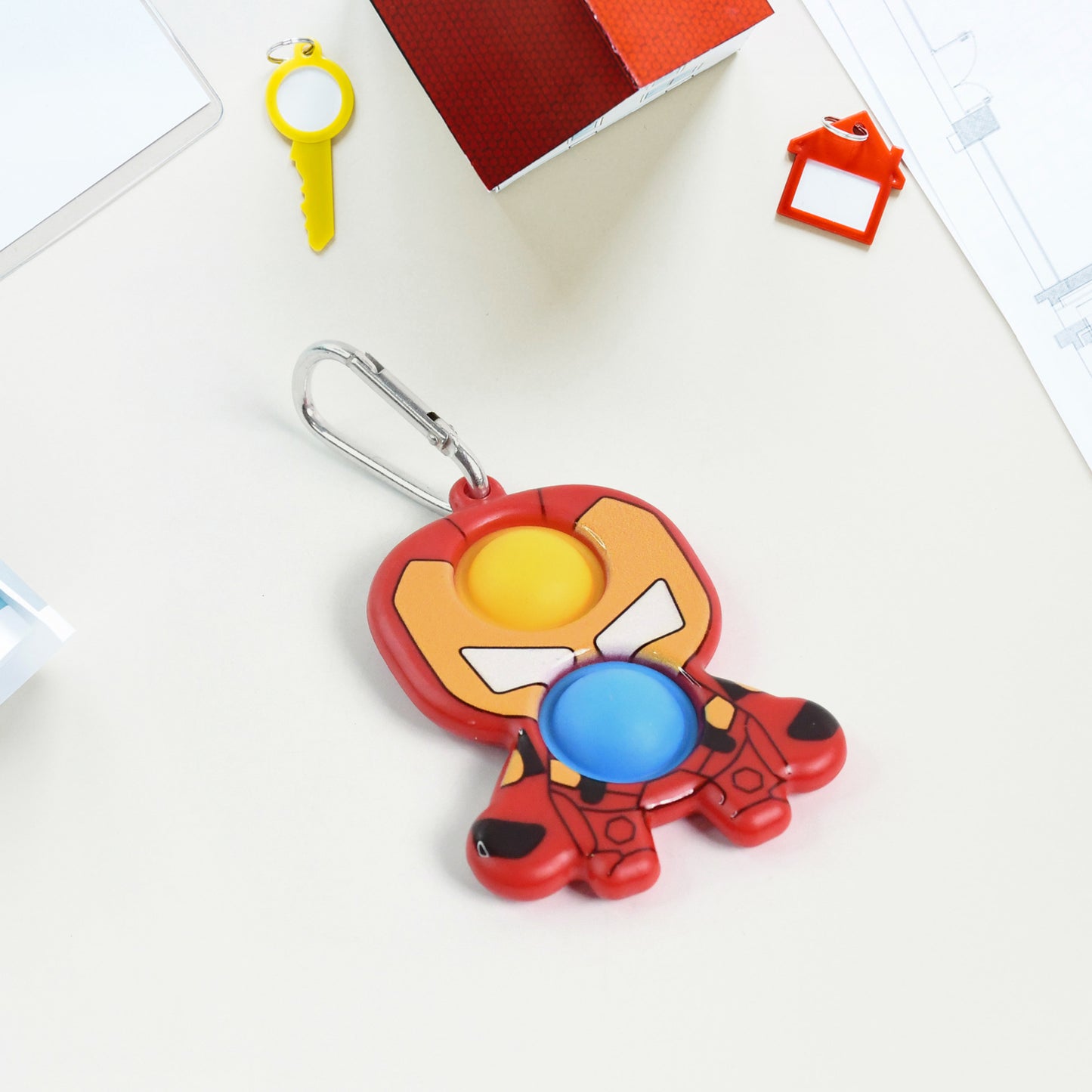 Superhero Iron Man shape keychain pop it toy by Wukusy, colorful silicone sensory fidget for kids and teens