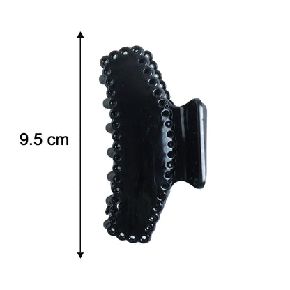 Black hair claw clip by Wukusy, showcasing its elegant design and sturdy plastic construction for secure hair styling.