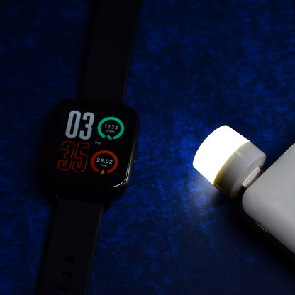 Wukusy 6293 USB LED night light plugged into a laptop, small portable LED nightlight ideal for PC and laptop use.