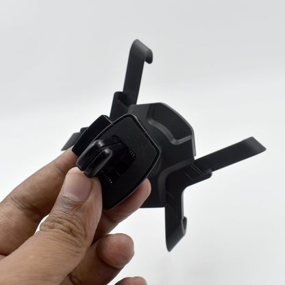 Wukusy 7310 2-piece car mount air vent holder attached to vehicle air vent for smartphone support.
