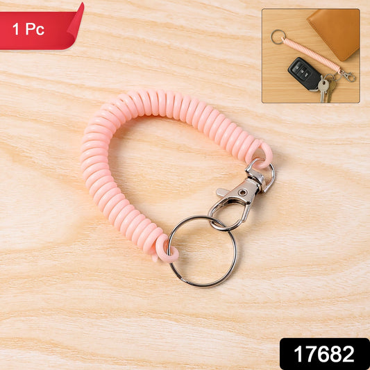 Wukusy elastic spiral coil keychain bracelet with metal key ring and clip hook, versatile accessory for keys or bags.