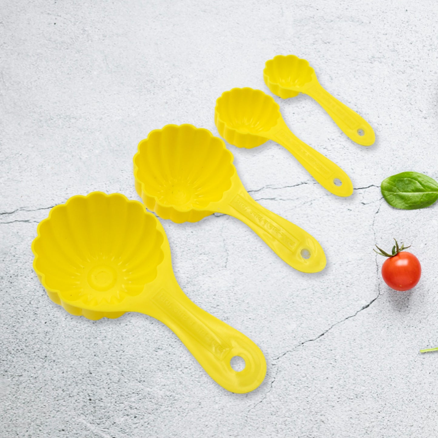 Wukusy plastic kitchen tool set with 4 ladoo molds and spoons for making various types of ladoos in the home kitchen.