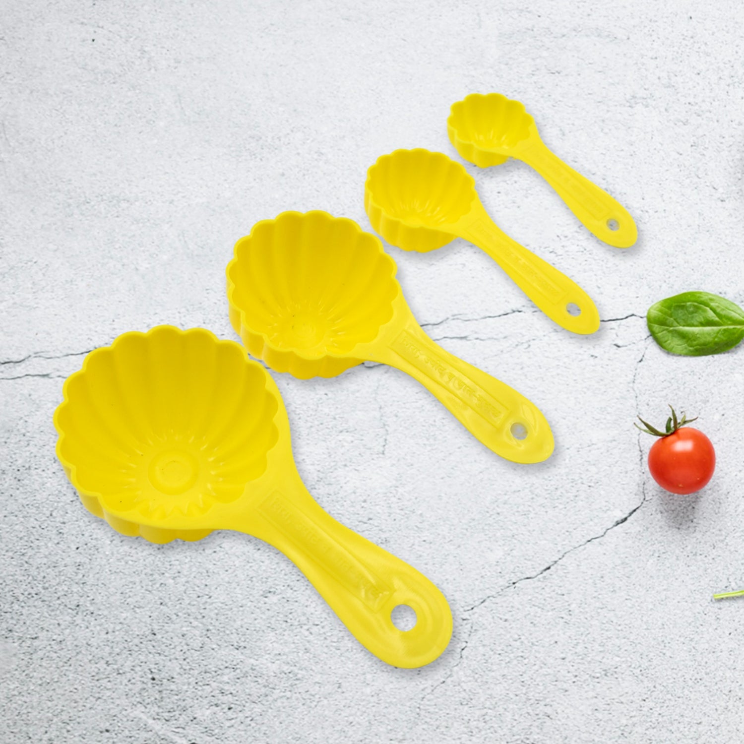 Wukusy plastic kitchen tool set with 4 ladoo molds and spoons for making various types of ladoos in the home kitchen.