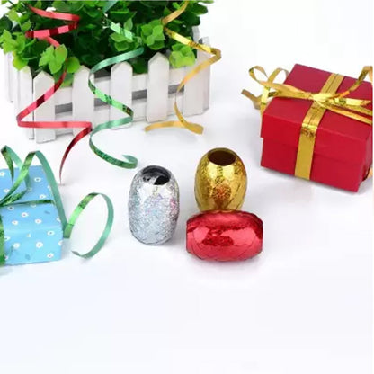 Wukusy curling balloon ribbon roll for gift wrapping and crafts, featuring colorful loops for home decor and balloon decoration.