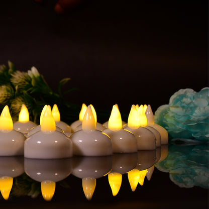 Set of 8 flameless floating tea light candles with transparent storage box, battery-operated decorative candles for wedding and home decor.