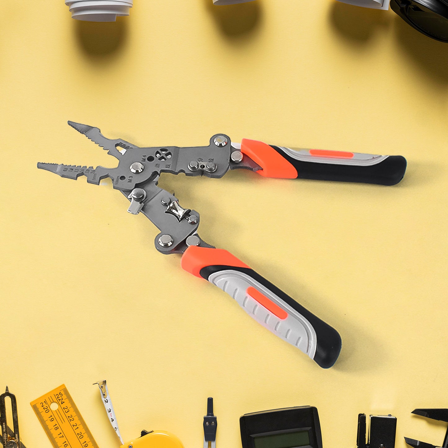 Wukusy 8-in-1 wire stripper pliers with soft grip handles, showing the versatile tool for stripping and cutting wires.