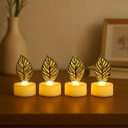 Set of four Wukusy decorative golden leaf-shaped flameless LED candles for home decor, featuring a warm, flickering glow.