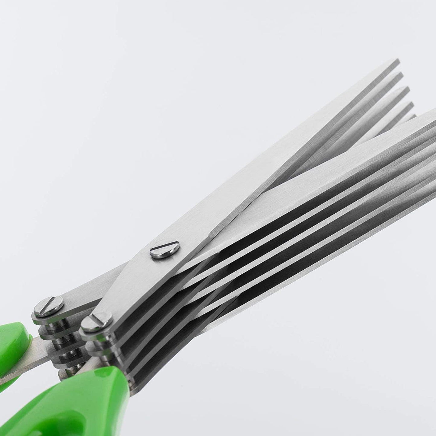 Wukusy 1563 Multifunction Vegetable Stainless Steel Herbs Scissor with 5 blades, showing the scissors with blades open and herbs.