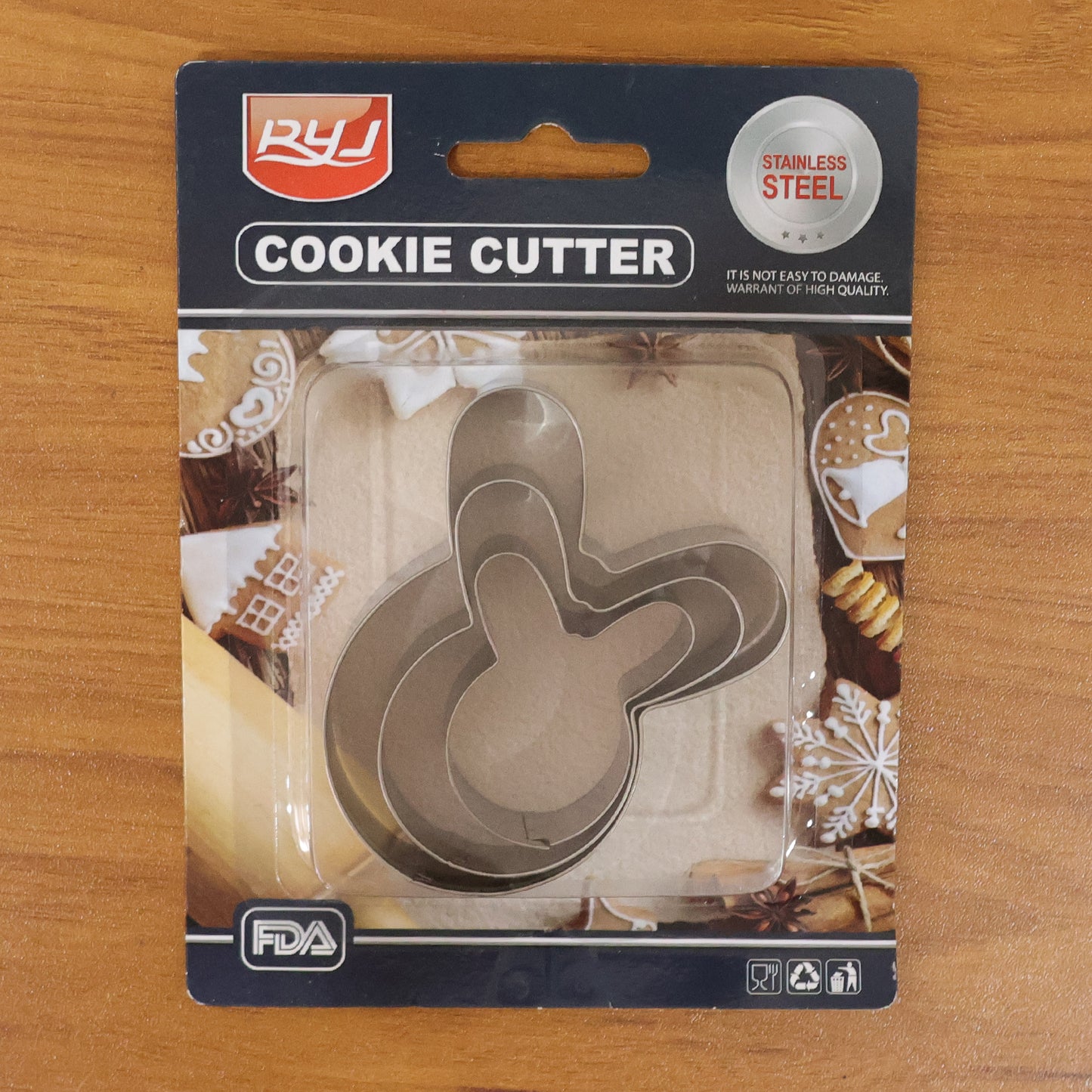 Set of three stainless steel house-shaped cookie cutters with varied designs from Wukusy, perfect for baking and decorating cookies.