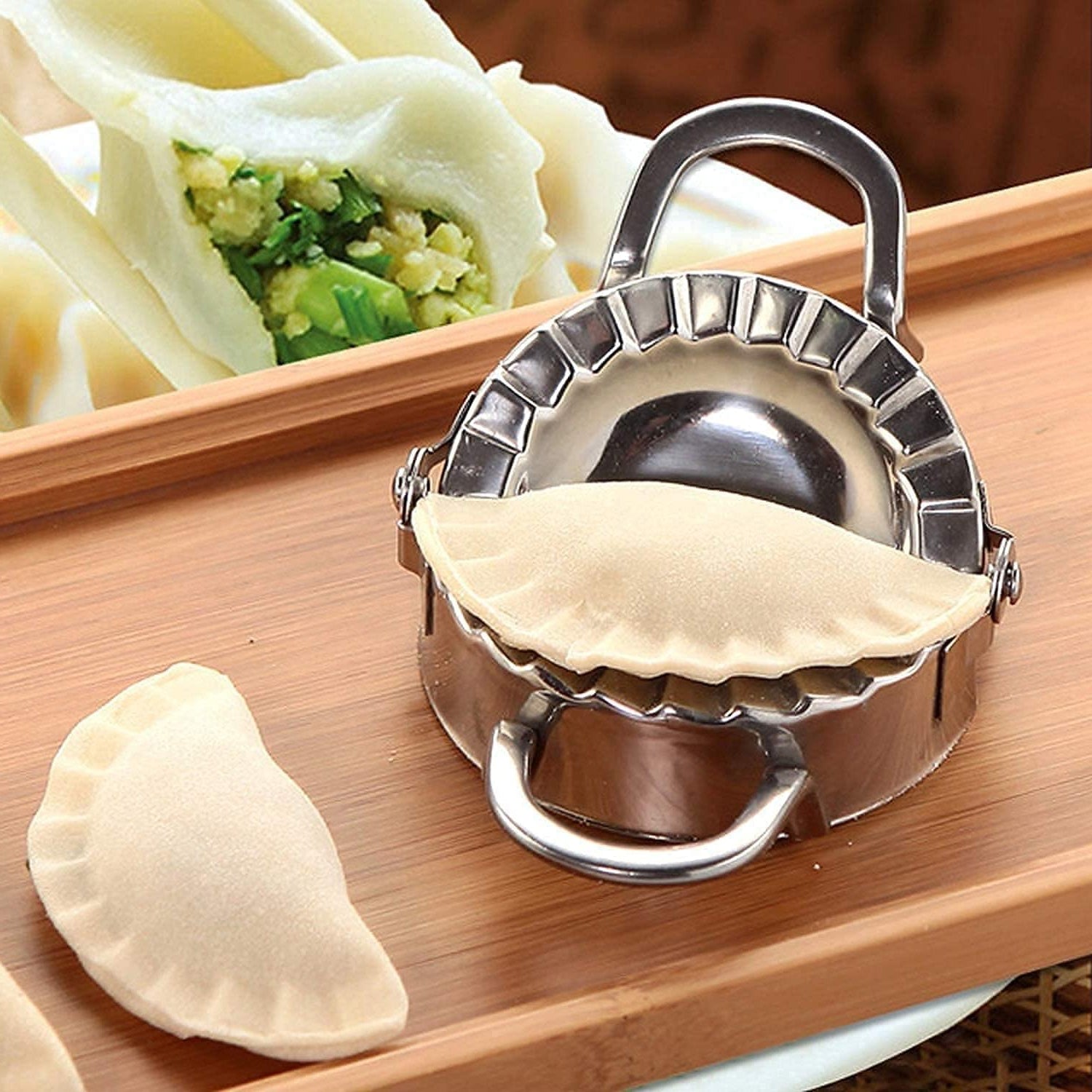 Wukusy stainless steel dumpling mold for making perfect dumplings, durable and convenient for home use, never rusty, 1-piece.