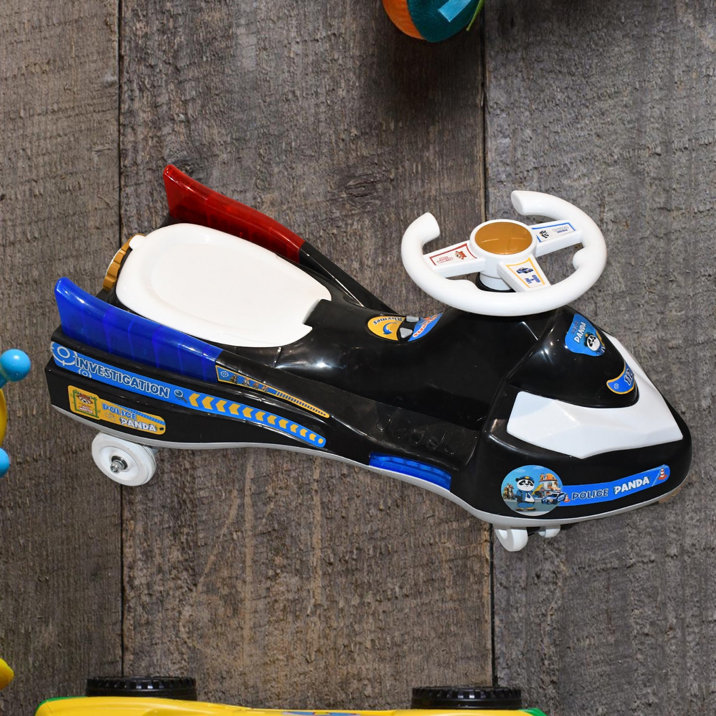 Wukusy Twisted Police Ride-on Toy Car for Kids with musical features, lights, and steering wheel in vibrant police car design