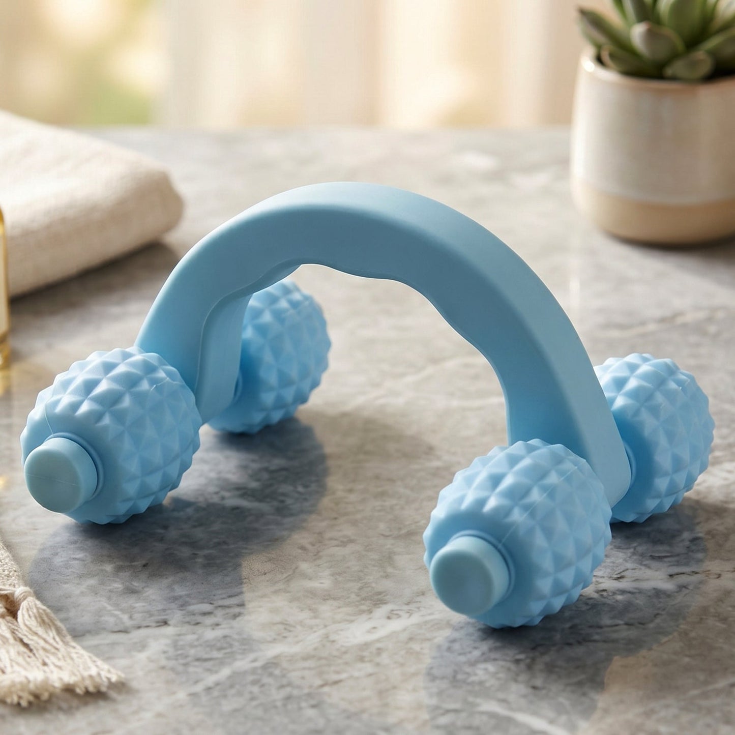 Wukusy handheld 4 roller body massager for muscle relaxation, shown with arms, legs, and back massage application