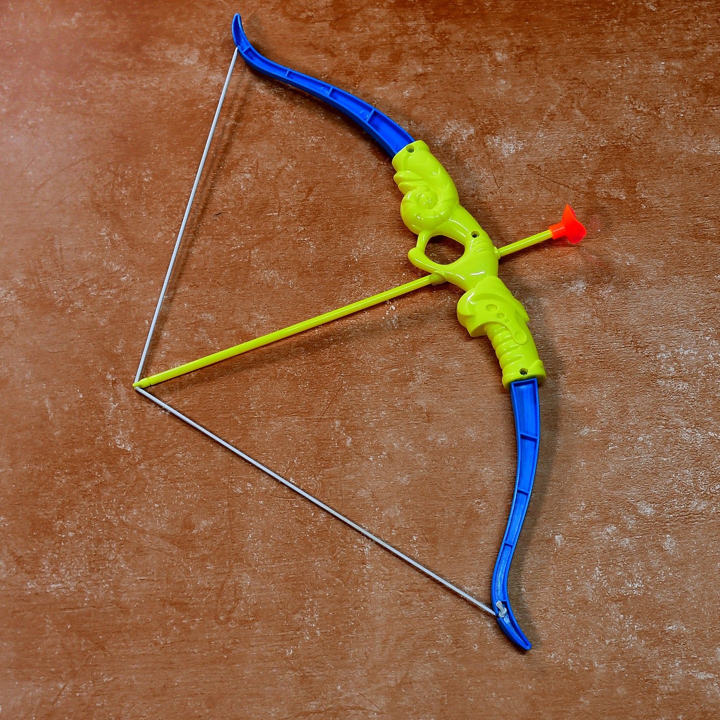Wukusy plastic archery bow and arrow toy set with three arrows, a target board, and a single toy knife on a plain background.