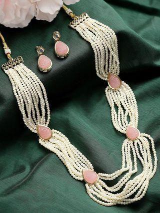 Pink carved stone and pearl beaded Rani Haar necklace set for women from Drpshippr's men's collection, featuring intricate craftsmanship.