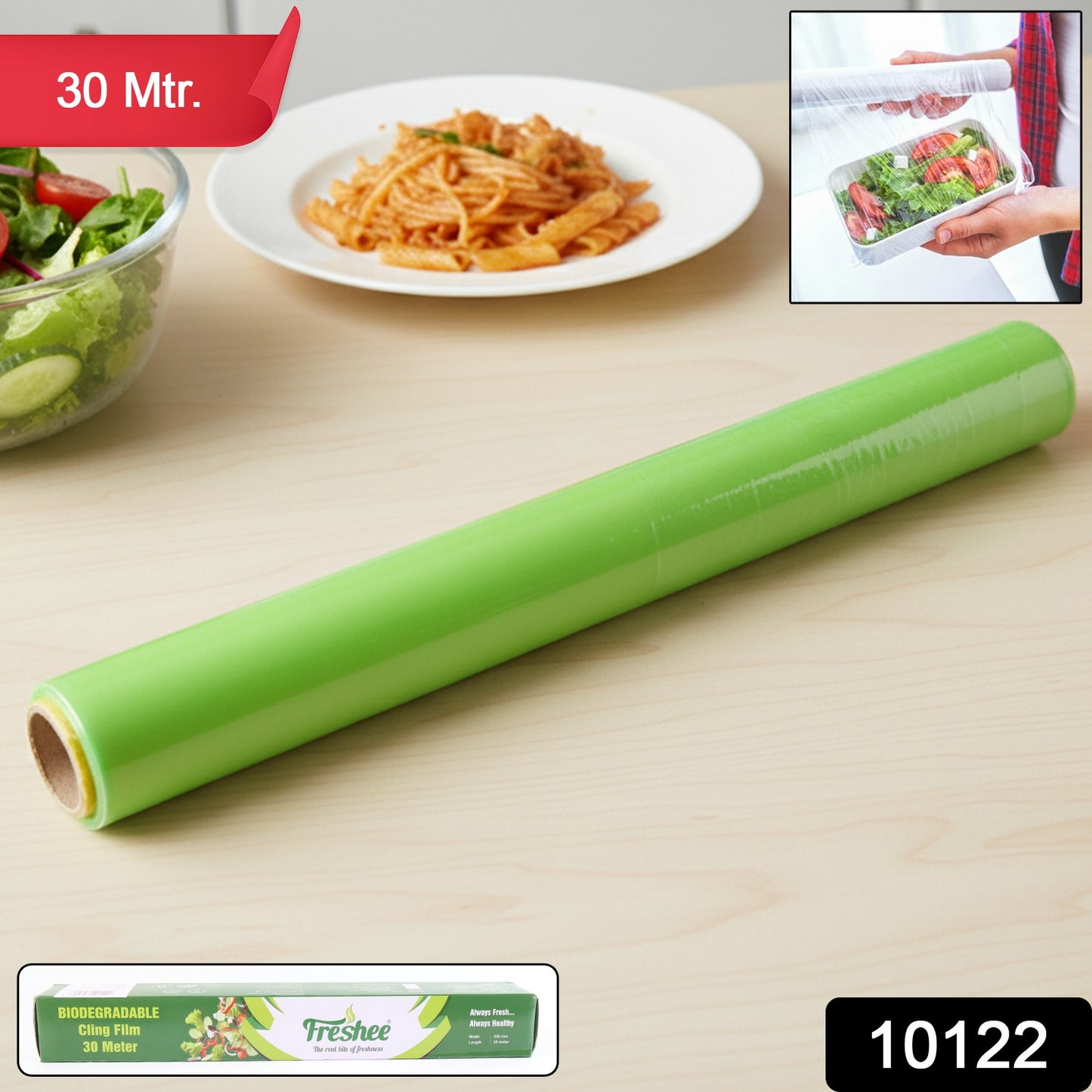 Wukusy Freshee biodegradable cling film roll, 30 meters long and 300mm wide, shown unrolled on a kitchen surface.