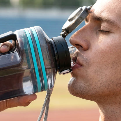 Large square Wukusy gallon water bottle with handle, 1500 ml capacity, transparent plastic design for easy carrying.