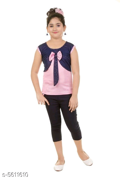 Kids wearing fashionable black and pink clothing sets from Seasons, casual and stylish kids' apparel in the image.