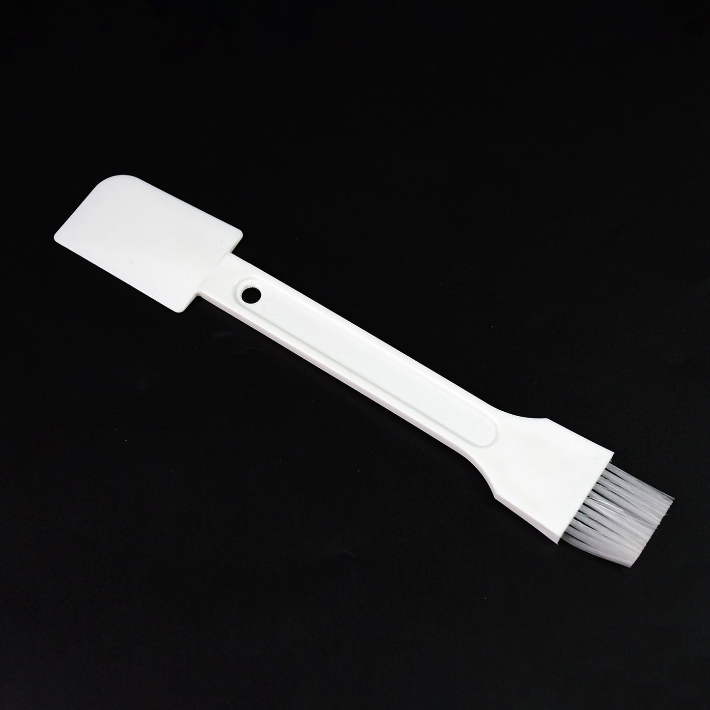 Wukusy multipurpose cleaning scrub brush with handle, ideal for kitchen grooves, slots, and dust removal in home cleaning tasks.