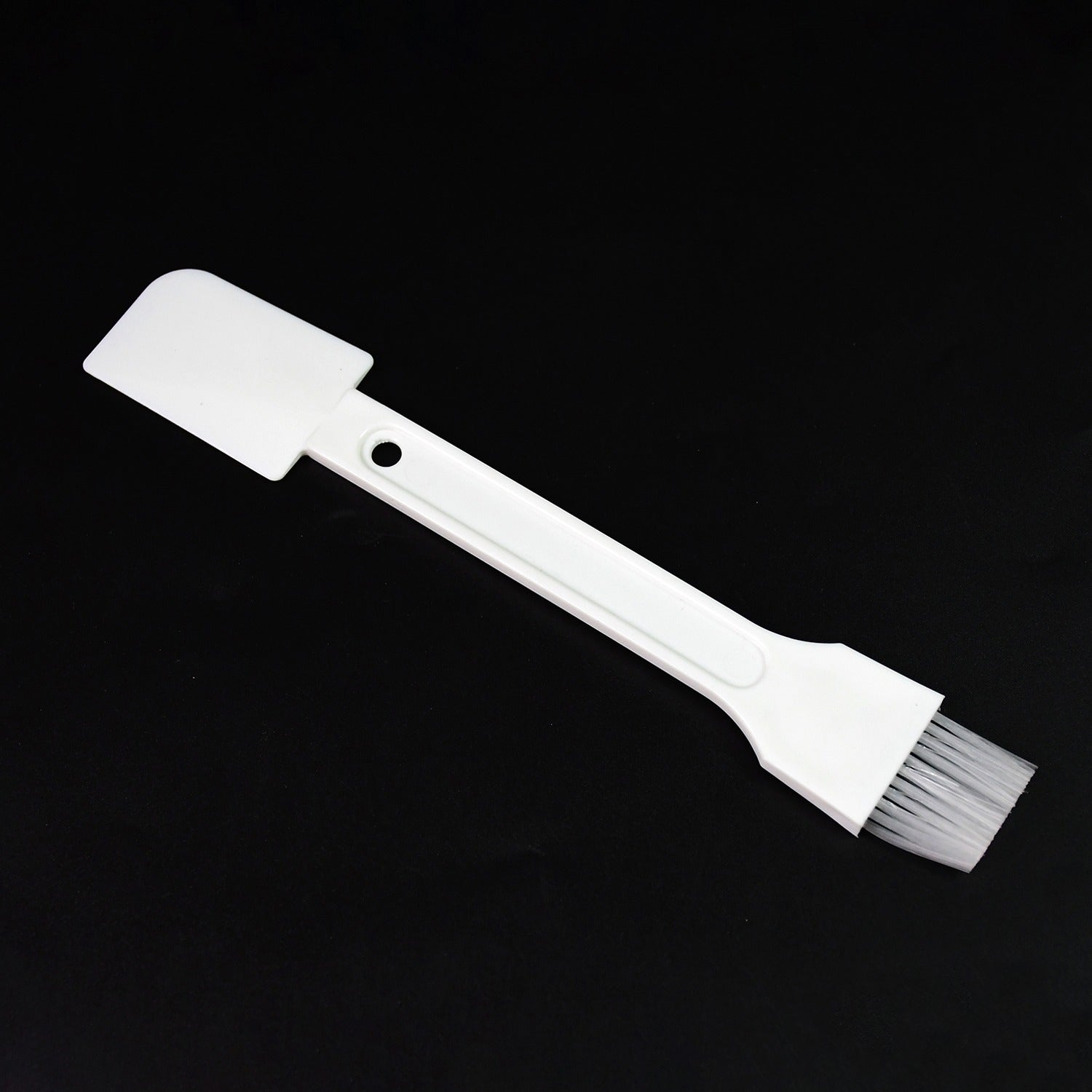 Wukusy multipurpose cleaning scrub brush with handle, ideal for kitchen grooves, slots, and dust removal in home cleaning tasks.